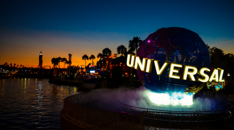 Sunset with bright lights at Universal Studios entrance in Florida orlando, theme, parks, amusement, guide, universal, studios