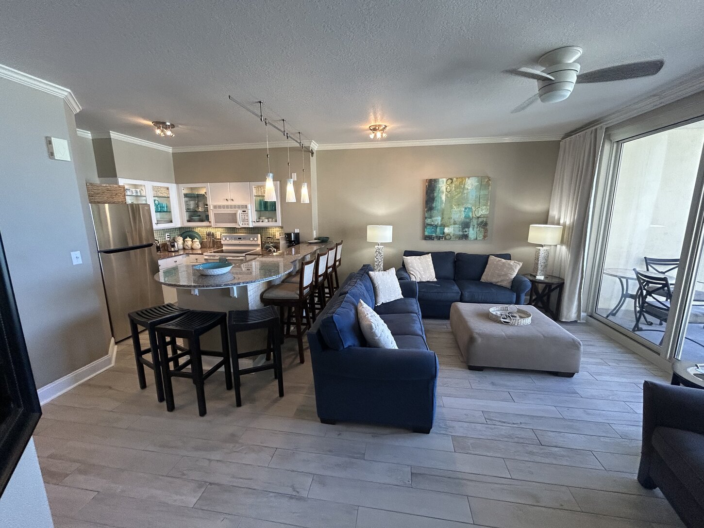 Coastal Cosmopolitan Decor, added driftwood  real tile to entry-kitchen-livingRm
