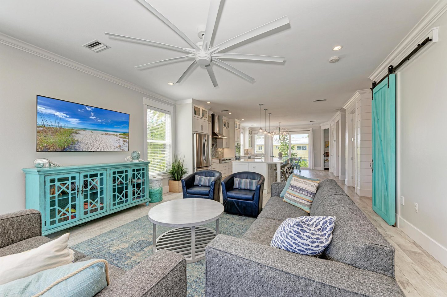 Main Level with Living, Kitchen and Dining, Sliders to Balconies on Both Ends