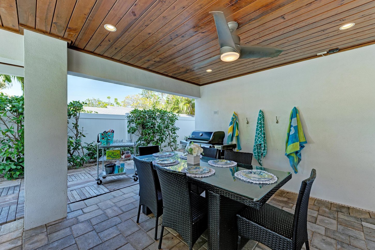 Outdoor eating area near pool.