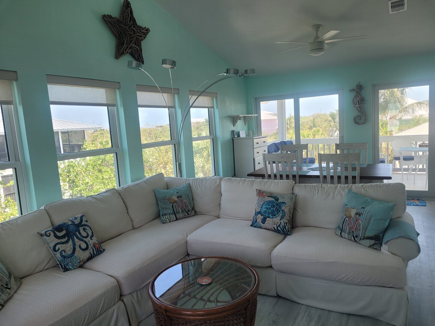 Ample room for all on the comfy couch to watch a movie on the Large Screen TV.