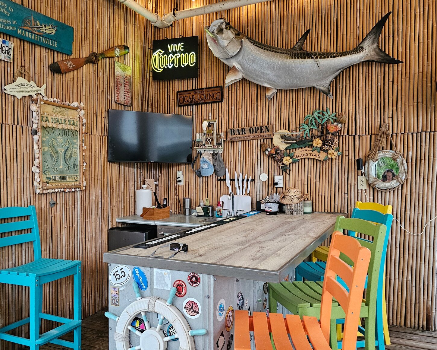 Enjoy the game at the pool bar with TV, Darts, and ring toss game