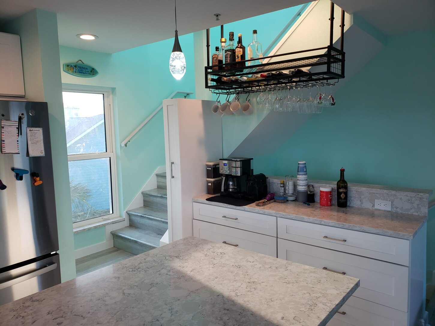 Enjoy an espresso/coffee, wine or drink at the drink bar with plenty of extra storage.