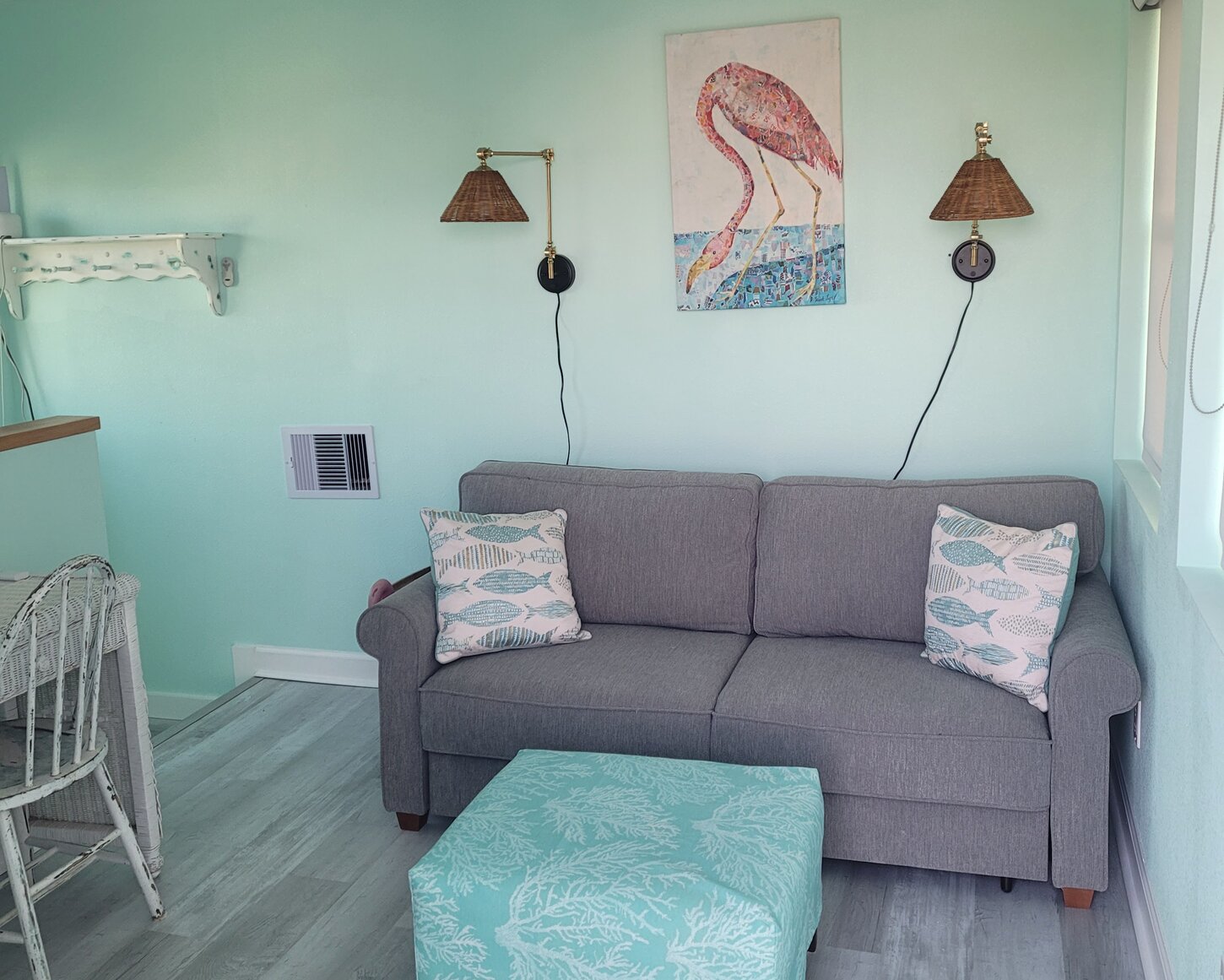 Large windows on three sides offer great loft views for this queen pullout room.