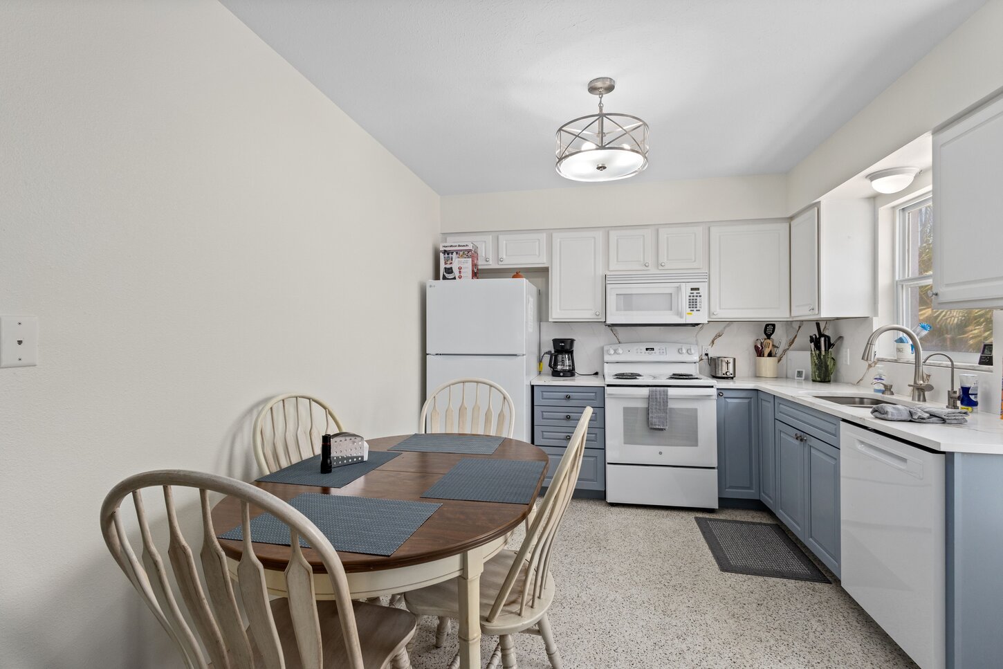 Quartz countertops.  Everpure water filter and separate faucet and connected to the ice maker.