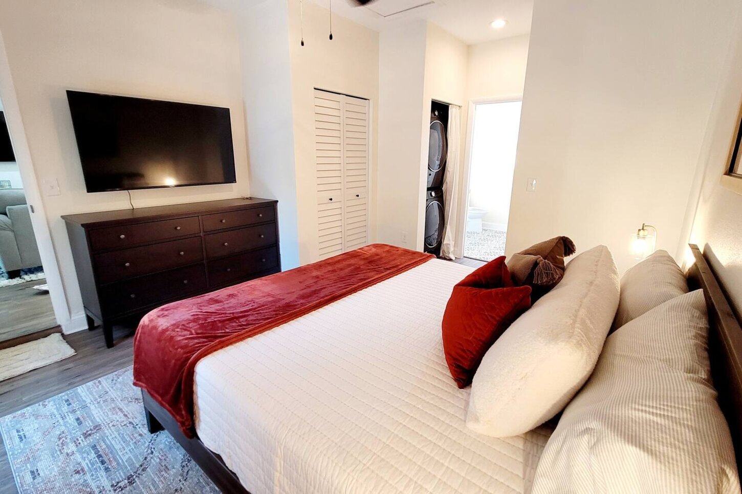 The owners suite also boasts a 55 inch TV, washer, dryer and private bath. 