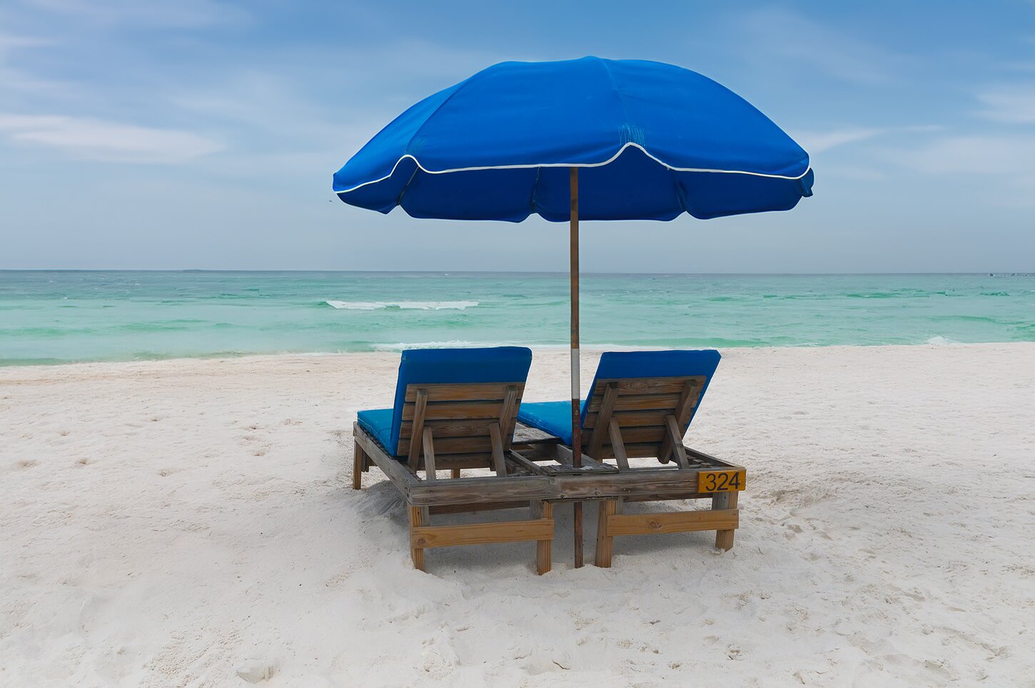 Two chairs and umbrella March 1st - October 31