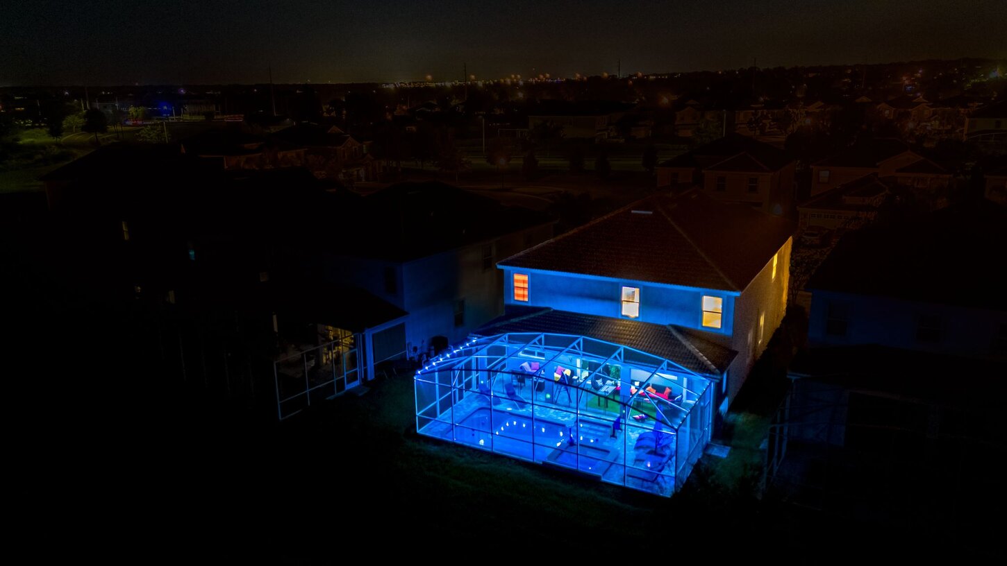  A welcoming exterior view  with relaxing outdoor areas, perfect for gatherings and family fun.