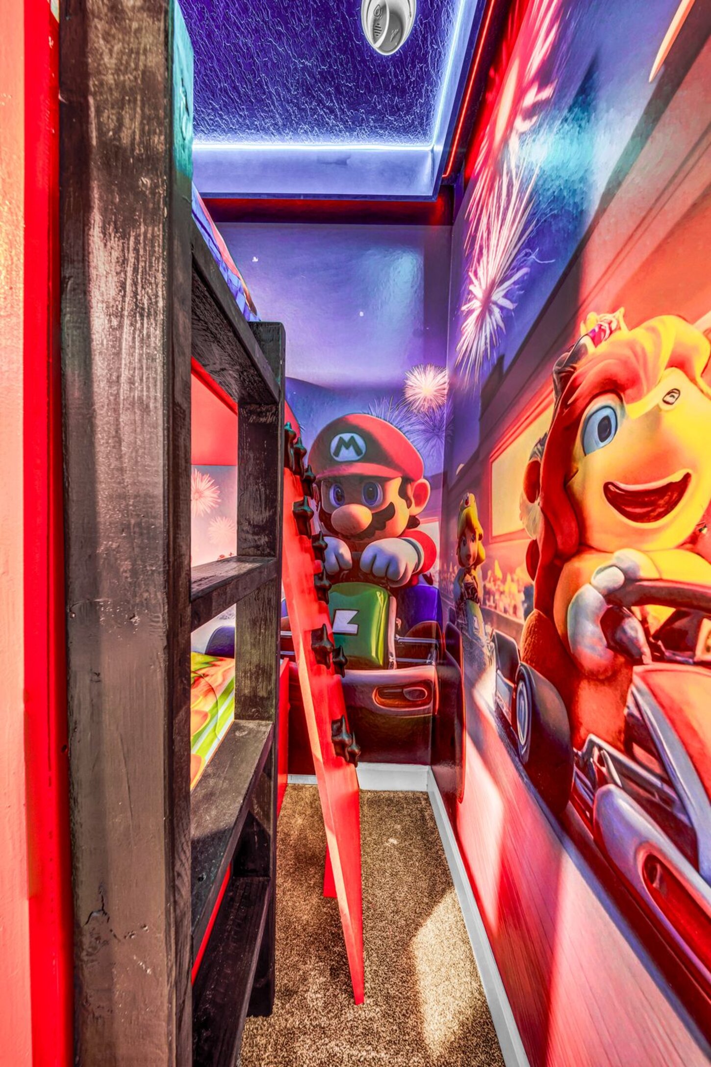  Mario themed room with a fun climbing pad, perfect for kids to explore and play.