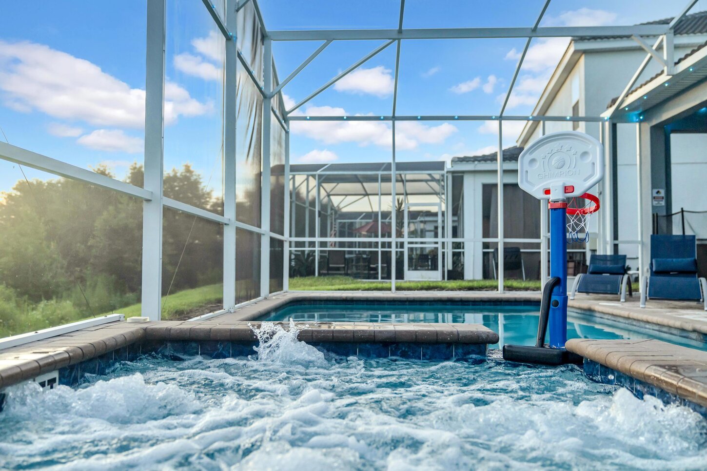  A private hot tub sanctuary  paired with poolside basketball  offers the perfect mix of relaxation and play.