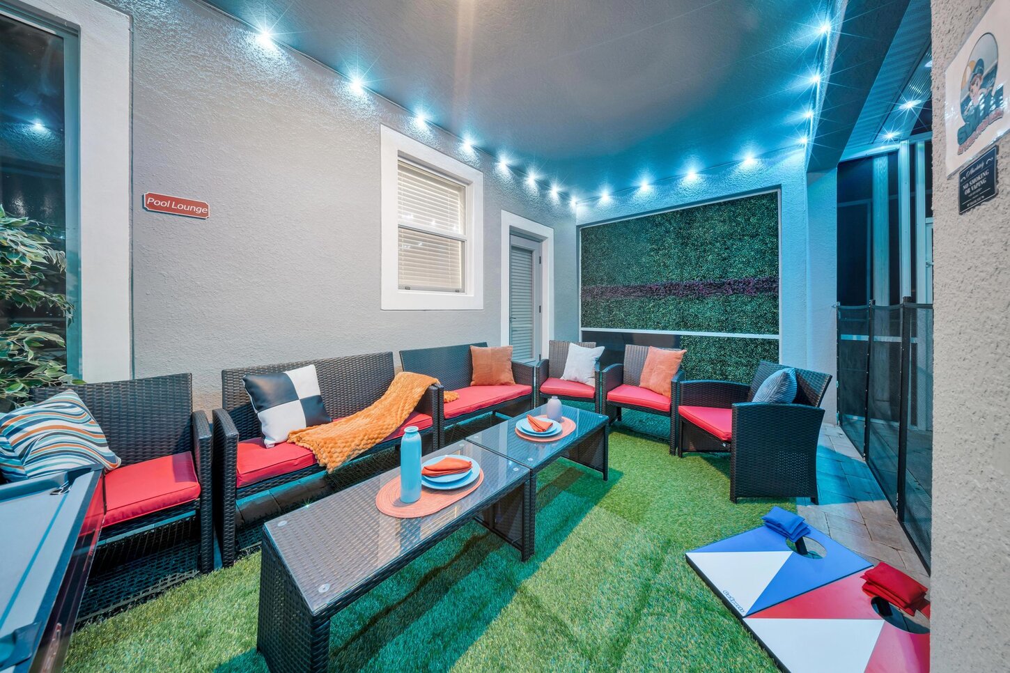  A perfect mix of play and relaxation challenge friends to corn hole, toss the ball around, then unwind in the egg chair  or relax in the seating area.