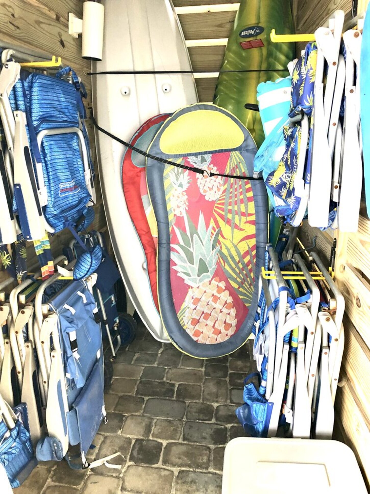 Pool closet also has sand toys, boogie boards, and skim boards