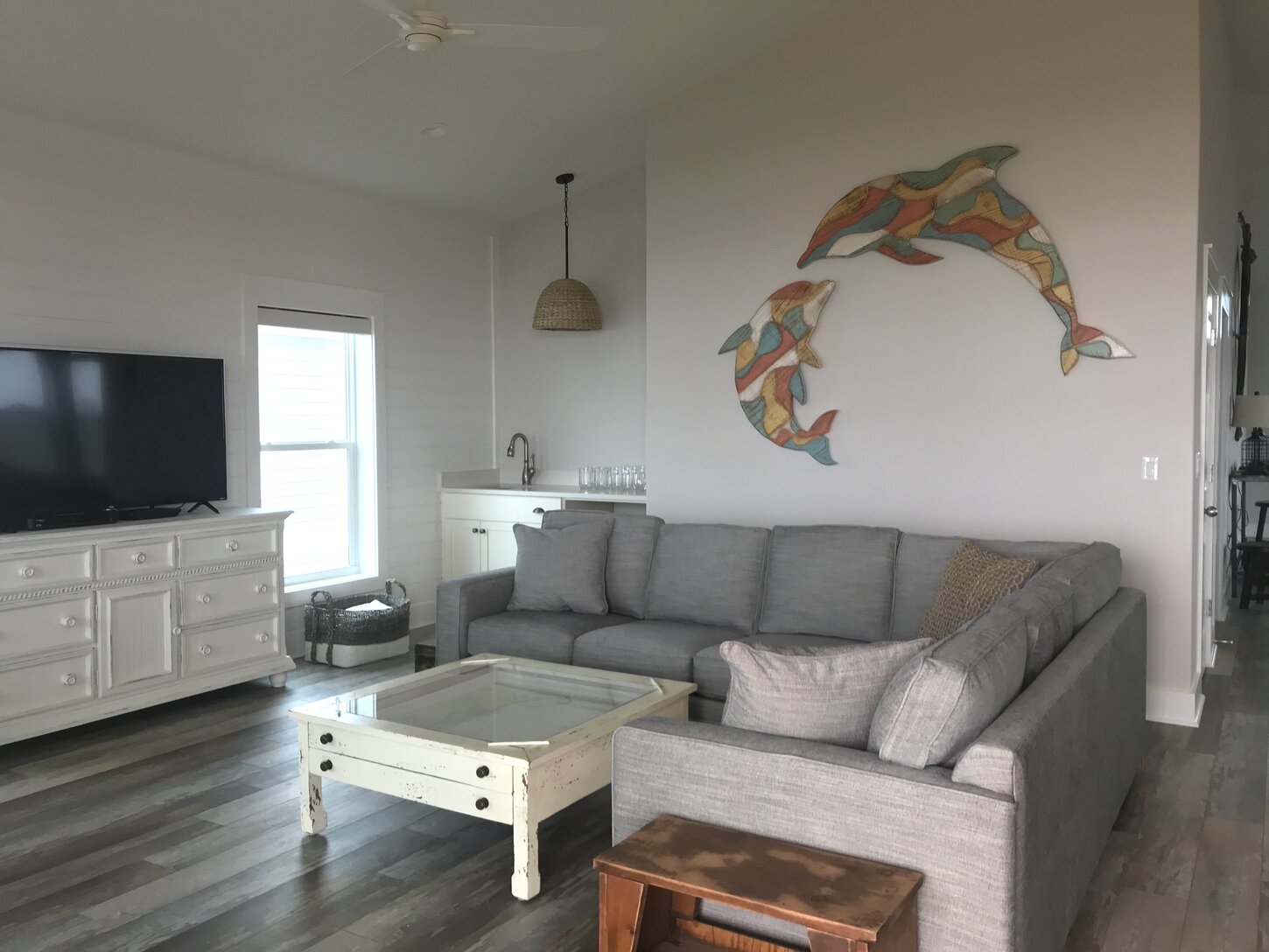 Top level living room, custom artwork