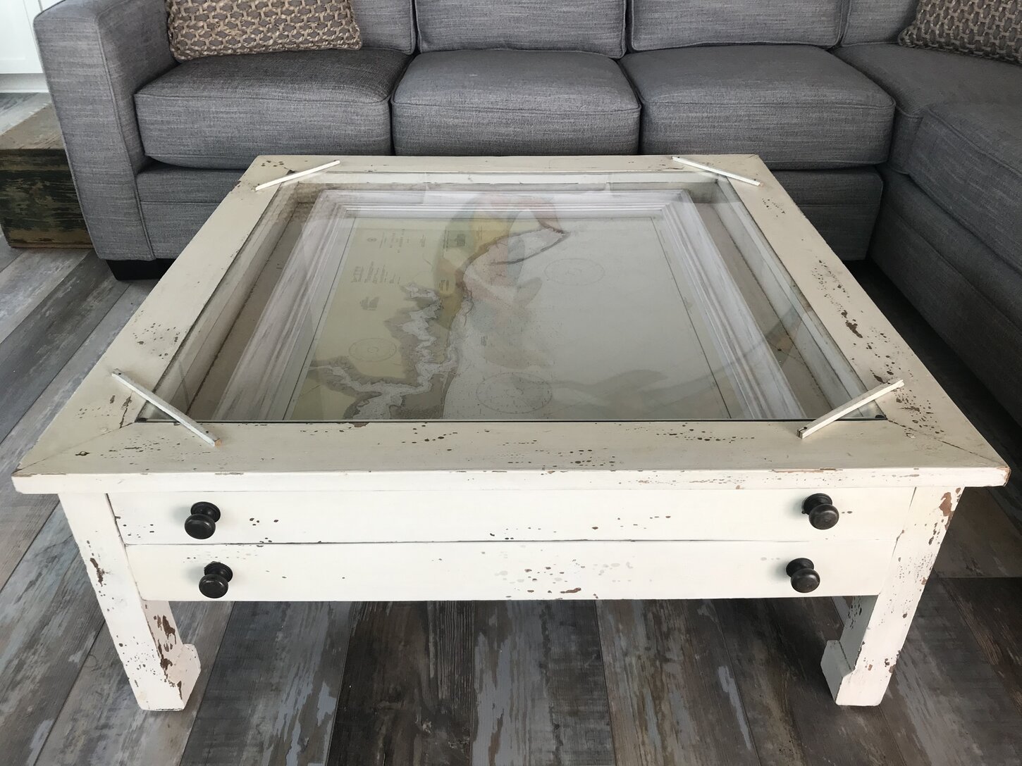Antique table holds map of the Cape