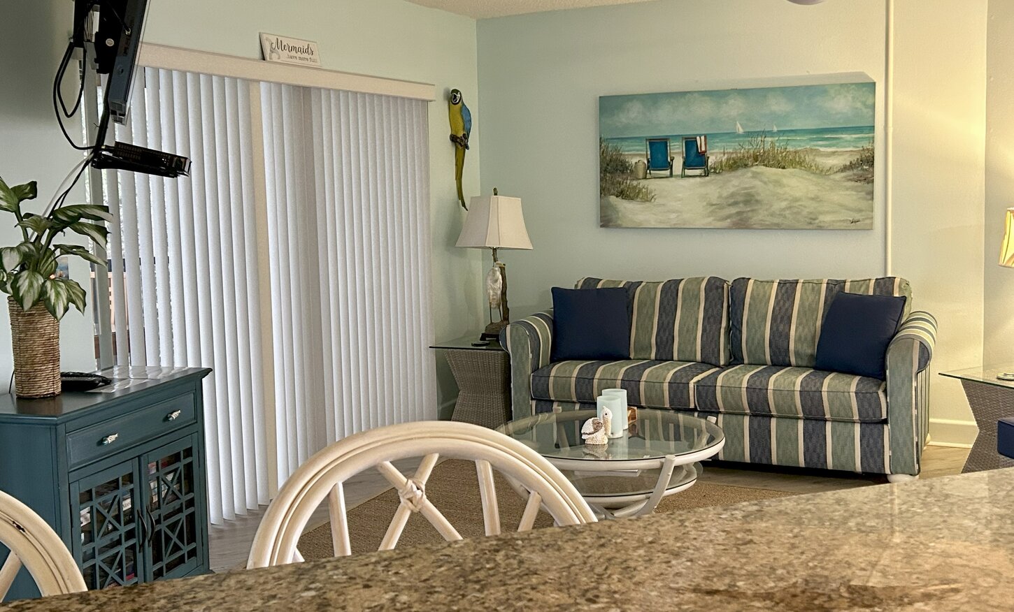Queen sleeper sofa in living room with views of the Gulf AND Sarasota Bay
