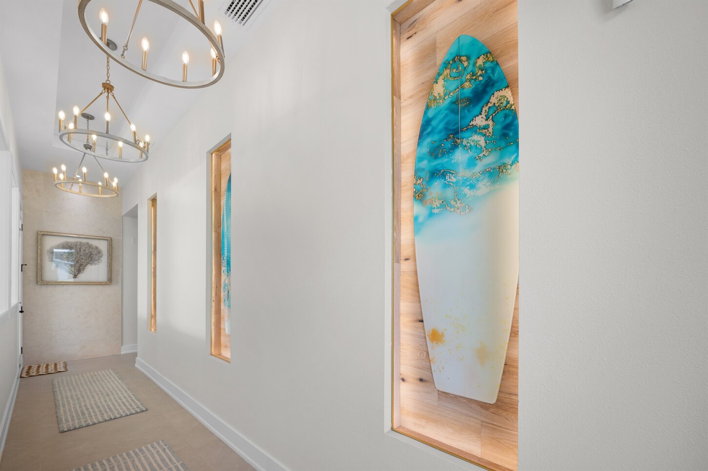 Bright hallway with curated island dcor