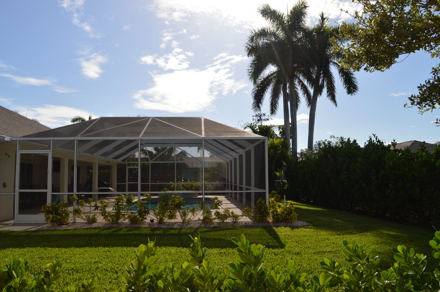 Plenty of green space surrounding the lanai.