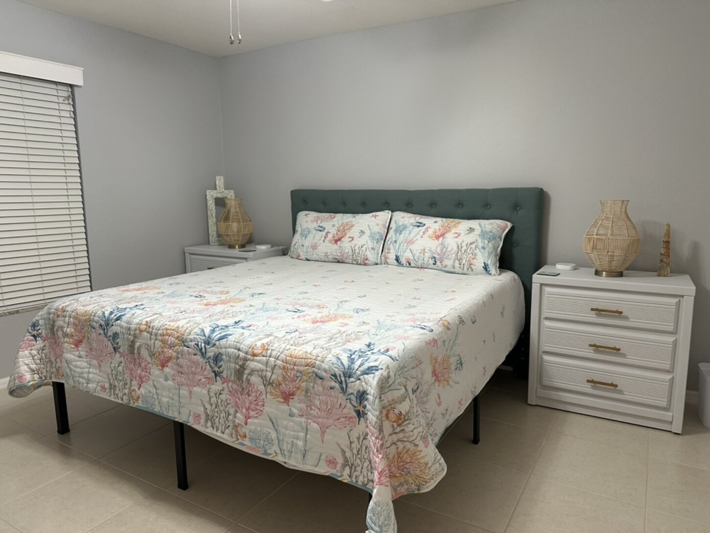 This King bedroom with walk-in closet is right next to a full bath with direct lanai and pool access.