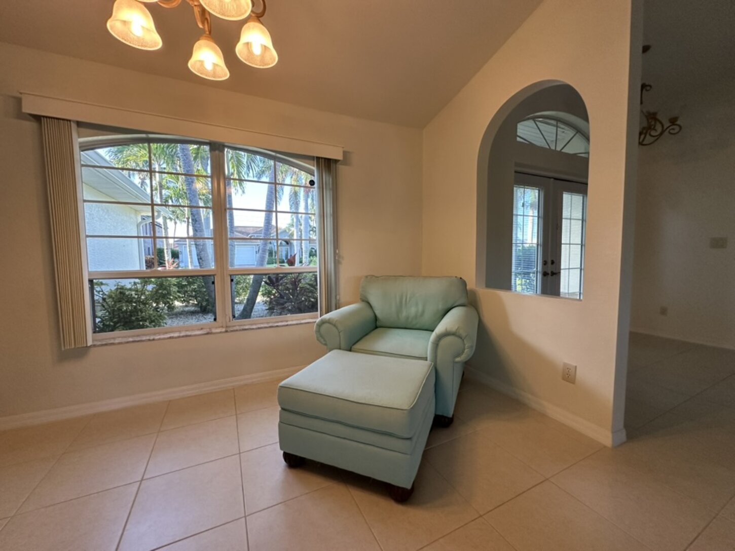 A cozy reading nook with a garden view is perfect for unwinding with a book—or sneaking in a nap.