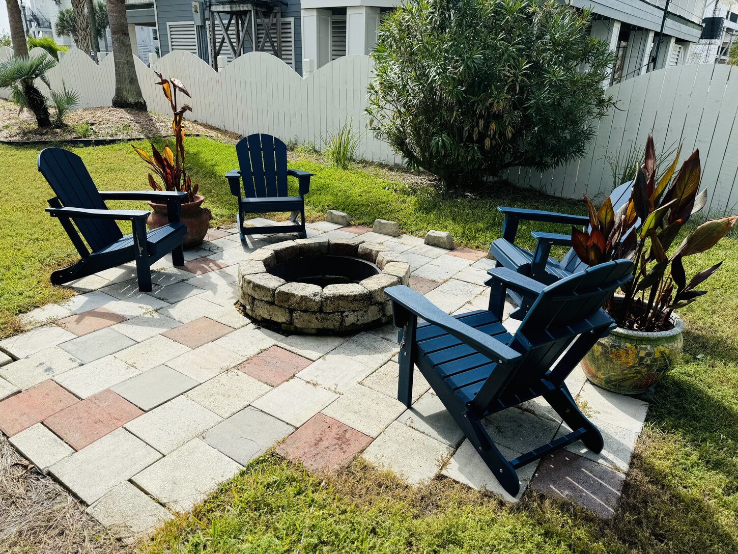 Fire pit with seating in backyard