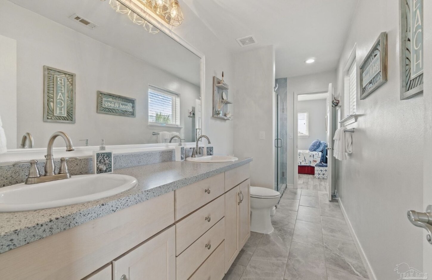 Full bathroom with tiled shower