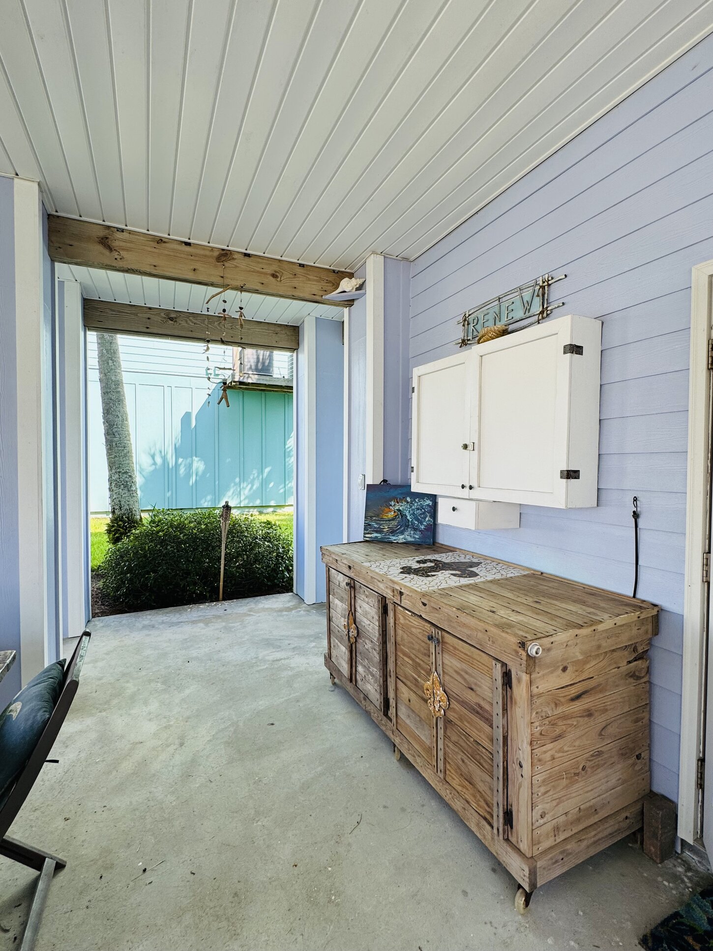 Back patio with serving area and tv