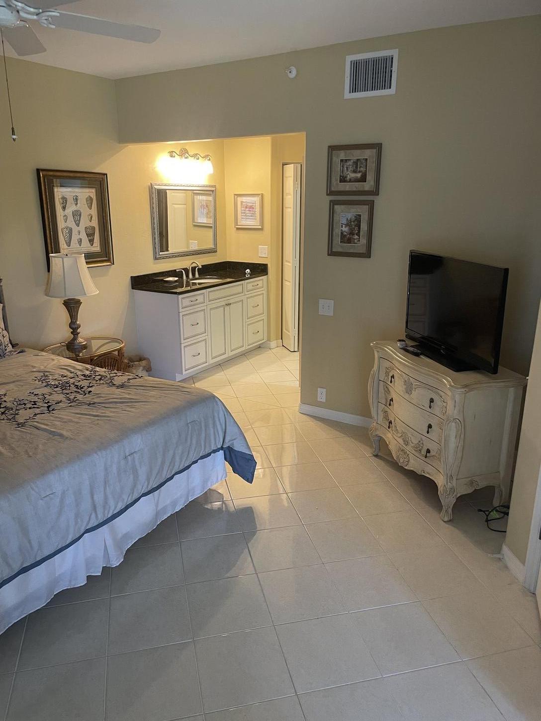 Master bedroom with King bed has 2 walk-in closets, TV and cable service