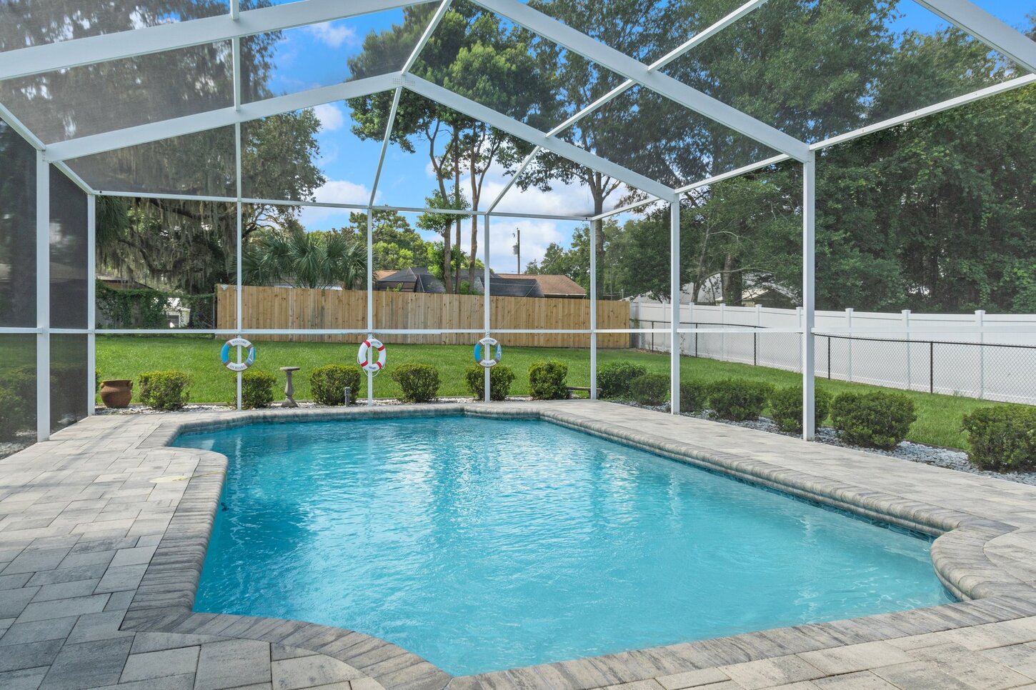 Enjoy morning coffee (or evening cocktail) at the pool with an ocean oasis view! 