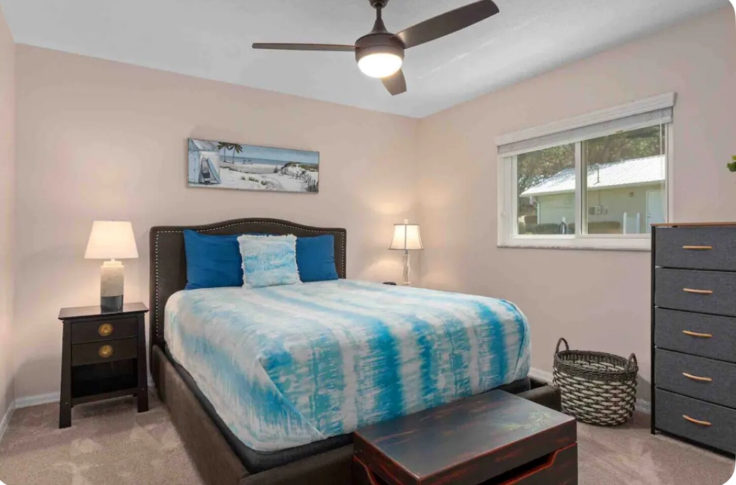 Bedroom #2 is a cozy room with queen bed and soft blanket.