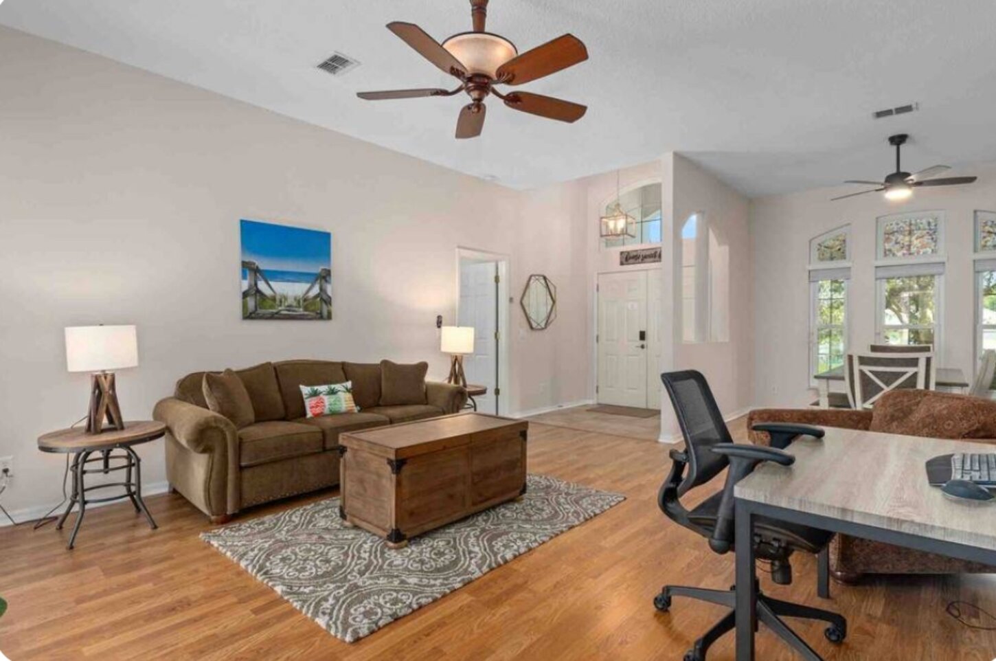 Dedicated workspace and comfortable couch to relax upon; great for taking afternoon naps. 