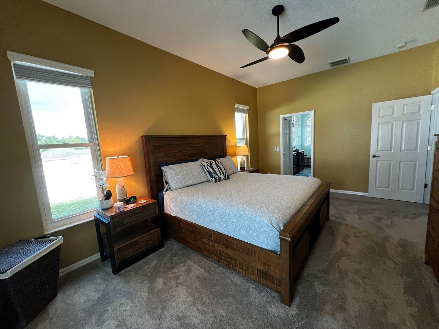 Spacious well lit master bedroom during the day and dark at night for a restful sleep on a comfortable king size bed (new November 2024). Plenty of dresser space and large walk-in closet for longer stays.  Freshly painted May 2025.
